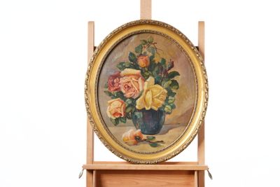 a picture of a painting of roses in a vase on a easel