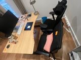 an overhead view of a home office with a desk and chair