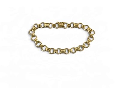 a close up of a gold chain bracelet on a white background