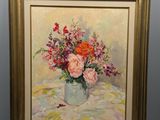 une peinture à l'huile représentant un vase de fleurs sur une table
