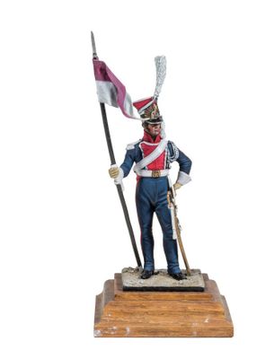 a statue of a man in a uniform holding a flag