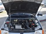 a car with its hood open with the hood up
