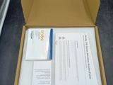 a box with some papers in it sitting on a table