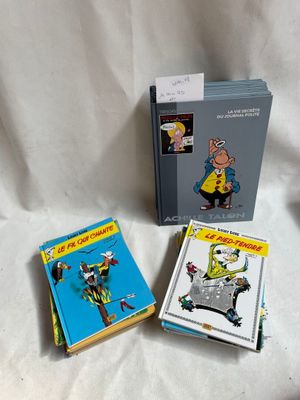 trois livres pour enfants sont posés sur une nappe blanche