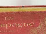 a red book that is sitting on top of a table