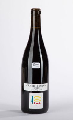 a bottle of wine that is sitting on a table