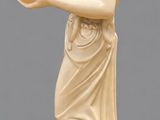 an image of a statue of a woman holding a flower