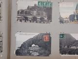 a book with pictures of old buildings on the pages