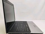 an open laptop computer sitting on top of a white table