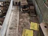 a machine that is working on a piece of metal