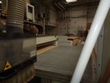 a picture of a machine that is working on a piece of wood
