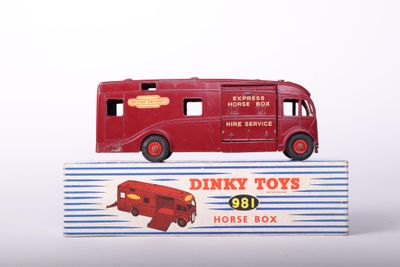 a toy truck that is sitting on top of a box