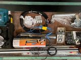 a box filled with assorted items on a table