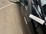 a car that has a sticker on the side of it