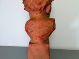 an image of a clay sculpture of a lion head