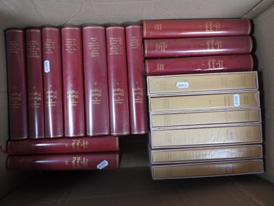a lot of books in a box on the floor