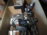 a box full of assorted electrical equipment in a room