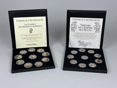 deux pièces d'argent dans un coffret noir sur lequel figure un certificat