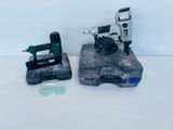 two tools that are sitting on top of a table