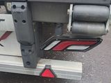 a close up of the rear end of a truck with a winch on it