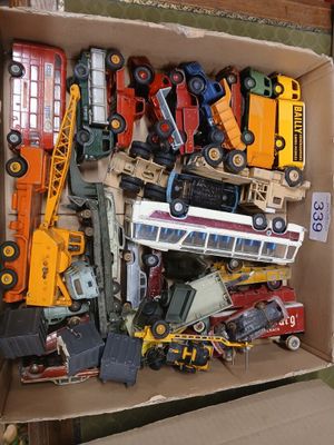 a box full of toy cars and trucks in it