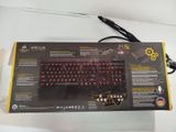 a box with a keyboard inside of it on a table