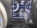the dashboard of a car with a digital display on it