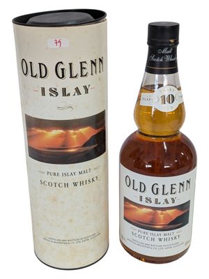 un vieux whisky écossais « Glenn's Islay » dans une boîte métallique