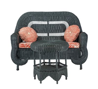 an image of a wicker settee with a table and two chairs
