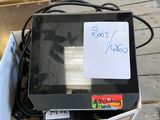 a box that has a computer in it on the ground
