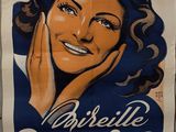 an old poster of a smiling woman with her hand on her face