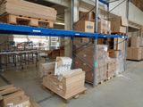 a large warehouse filled with lots of boxes and pallets