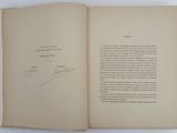 a close up of a book with a handwritten page on it