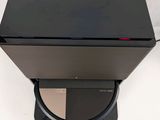 a close up of a laptop computer sitting on top of a stand
