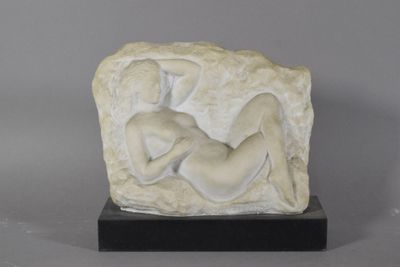 marble sculpture of a woman reclining on a rock on a marble base