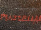 an image of a close up of a graffiti on the side of a building