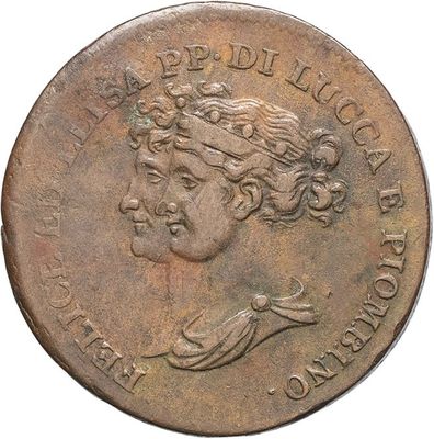 a close up of a coin with a woman ' s face on it