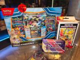 a display of pokemon cards on a table in a store