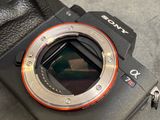 a close up of a camera with a lens attached to it
