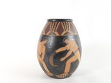 a vase with a painting of a man and a woman on it