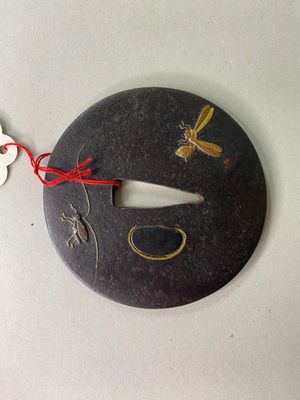 Japon, fin de la période Edo, Tsuba marugata en fer, à décor…