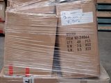 a large stack of boxes sitting on a pallet in a warehouse