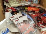 a cardboard box filled with assorted candy and candy bars
