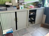 an image of a cluttered office with a lot of clutter on the floor