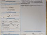 a picture of a receipt and a mouse on a table