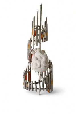 a sculpture of a hand holding a ball in the shape of a brain