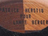 a close up of a label on a wooden object