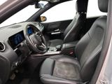 the interior of a car with a steering wheel, dashboard, and dashboard controls