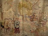 an image of a painting on a wall of people and animals