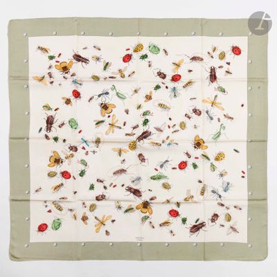 a close up of a square scarf with insects on it